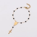 Top view of gold religious rosary bracelet with black beads, medal and cross charm - 17+3cm / Black