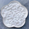 White cloud-patterned acrylic cylinder beads for DIY jewelry in a gold-rimmed dish - 8x20mm / White