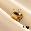 Detail view showing a gold square ring with black resin and sunburst texture, 1.7cm in length - Gold-Black Enamel