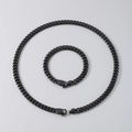 Classic black stainless steel Cuban link necklace and bracelet set in a flat lay view - Bracelet 21.5cm / Round Polished / 9mm / Black