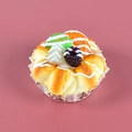 Artificial cream bread model with kiwi and berries on a decorative paper tray - Blackberry