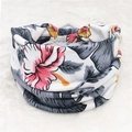 Bohemian floral wide headband featuring pink tropical blossoms and grey leaves on white fabric - 72