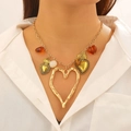 Gold chunky chain necklace with irregular hollow heart and red heart pendants on a model - KC Gold Mixed Necklace