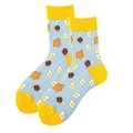 Light blue crew socks with yellow accents featuring breakfast eggs and toast patterns - Light Blue Breakfast