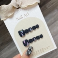 Minimalist matte black press-on toenails with rainbow holographic flame design - Large (L)