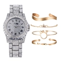 Detail view of luxury rhinestone watch and gold-tone stackable bracelets on white background - Style 4 (bow Box)