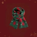 Green knitted scarf featuring red Christmas trees and snowflakes with a festive background - Green Christmas Tree