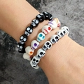 Gothic punk bracelets with skull beads in black and multicolor patterns for men - Black and White Colored Skull Bead Bracelet 3-Piece Set