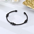 Detail view of black cable twist stainless steel cuff bracelet with five polished round beads - Style 4 / Black