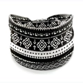 Elastic wide headband featuring black and white African tribal geometric patterns - Black