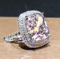 Elegant white gold variant ring featuring a cushion-cut pink cubic zirconia with double halo - Ur0677b
