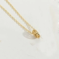 Elegant gold plated necklace featuring a hollow circular pendant on white texture - Circle Style