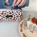 Detailed macro view of retro floral corduroy pencil case texture and metal zipper - Cream Flower Branch