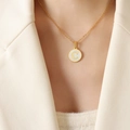 Gold plated letter C round shell pendant necklace on female model neck styling - Letter C (RP014)