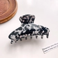 Minimalist acetate hair claw clip featuring black and white marble tortoise pattern - 8.5cm / Black and White