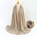 Beige pearl chiffon long scarf for women with soft textured fabric on a mannequin - Beige