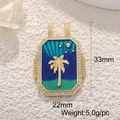Detail of gold tarot palm tree pendant with blue enamel inlay and zircon borders - Blue Green Enamel Palm Tree
