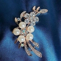 Elegant white pearl camellia flower brooch with rhinestones and gold-tone finish - Bouquet Brooch