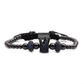 Detail of black crown bracelet with micro-set blue zircon beads on polished metal - Blue Zircon Gun Black Crown