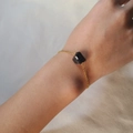 Minimalist gold chain bracelet featuring a natural irregular raw black tourmaline stone - Tourmaline