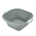 Gray silicone square folding strainer with light green handles for kitchen use - 8.5 Inch Square Foldable Bread Proofing Basket