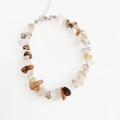 Macro detail of irregular amethyst gemstone bracelet with adjustable metal lobster clasp - Mixed Rutilated Quartz