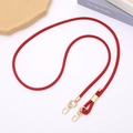 Detail of red denim braided strap with gold adjustable metal buckle and swivel clasp - Adjustable Crossbody / Red