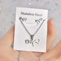 Detail of silver stainless steel jewelry set with heartbeat heart and paw print charms - TT-170 Heartbeat Cat Paw