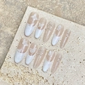 Uñas postizas French nude elegantes con mariposa 3D blanca y detalles de perlas - Extra Pequeño (XS) / 1873 Almendra Larga (Mariposa Francesa)