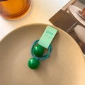 Elastico per capelli verde con doppia pallina per bambina su carta decorativa - Verde
