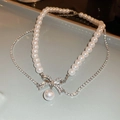 Macro detail of 14K gold-plated double-layer necklace with pearl bow and sparkling crystals - 21# Silver Rhinestone Bow Double Layer Necklace
