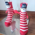 Close-up of magnetic 3D hand-holding socks with red stripes and cartoon snowman design - Red White Striped Snowman Hand Holding