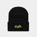 Close-up of yellow daisy embroidery on a black knitted beanie with clear texture - Flower / Black