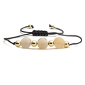 Detail of adjustable black woven rope bracelet with beige natural stone and gold beads - Topaz