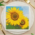 Square party napkin with vibrant sunflower print displayed on a white dining plate - Vibrant Sunflower (1002)