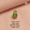 Pendaglio in oro rosa con pietra portafortuna in cristallo verde su raso rosa - verde chiaro