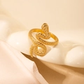 Adjustable golden snake ring with textured scales on a minimalist ceramic stand - Snake Scale Texture Style (BJGR0129)
