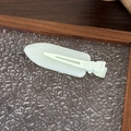 Close-up of light green matte hair clip on textured glass with a professional aesthetic - Small / Small Non-marking - Light Green