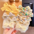 7-piece set of girls' floral and lace bow hair ties and clips in yellow and beige - Yellow Mesh Bowknot Style (0662-17)