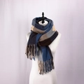 British style plaid scarf in navy, grey and khaki with fringe detail on a mannequin - Navy Blue