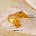 Makrofoto eines goldenen Umarmungs-Rings mit Details zu Größe 1,7cm und Gewicht 2,5g - Goldener Palmenring