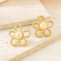 Macro view of French vintage floral 18K gold stainless steel earrings with pearl centers - Gold With Pink Artificial Pearl (KE115786-GC)
