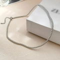 Elegant 2mm silver bead necklace with lobster clasp and extension chain on white box - 3mm Gray