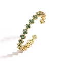 Adjustable gold clover bracelet with green crystals for women in elegant luxury style - Gold Green Zirconia Clover Bangle