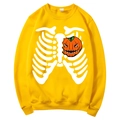 Bright yellow Halloween sweatshirt featuring white rib cage and orange pumpkin heart print - S / Tops / Yellow (Halloween Skeleton Pumpkin)