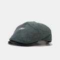 Detail of wool fabric and black leather brim on dark green vintage newsboy cap - One Size / Dark Green