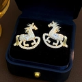 Golden rocking horse stud earrings with white zircons in a navy velvet jewelry box - E7944 Silver Pin-Gold White