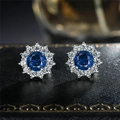 Elegant flower-shaped stud earrings with deep blue center stone and zircon halo - Blue