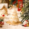 Miniature white Christmas tree scented candle with colorful dots and golden bell detail - Christmas White