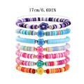 Detalle del set de 7 pulseras bohemias de cuentas de arcilla con colgantes de flores - SY0040 (Set de 7/Combinación Multicolor)